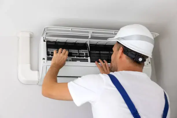 Cardinal Heating, Air & Plumbing cooling technician serving Bellevue